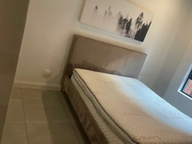 Mattress surface being cleaned to remove dust and dirt