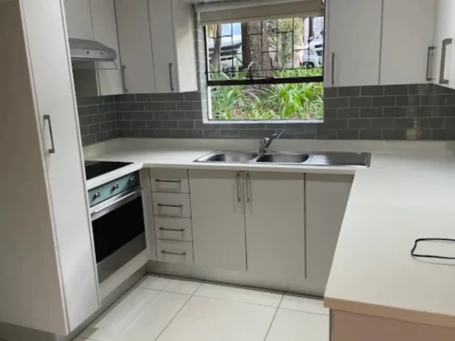 Professionally cleaned kitchen surfaces and cupboards