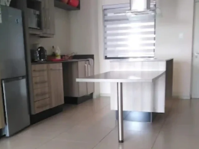 Professionally cleaned kitchen surfaces and cupboards